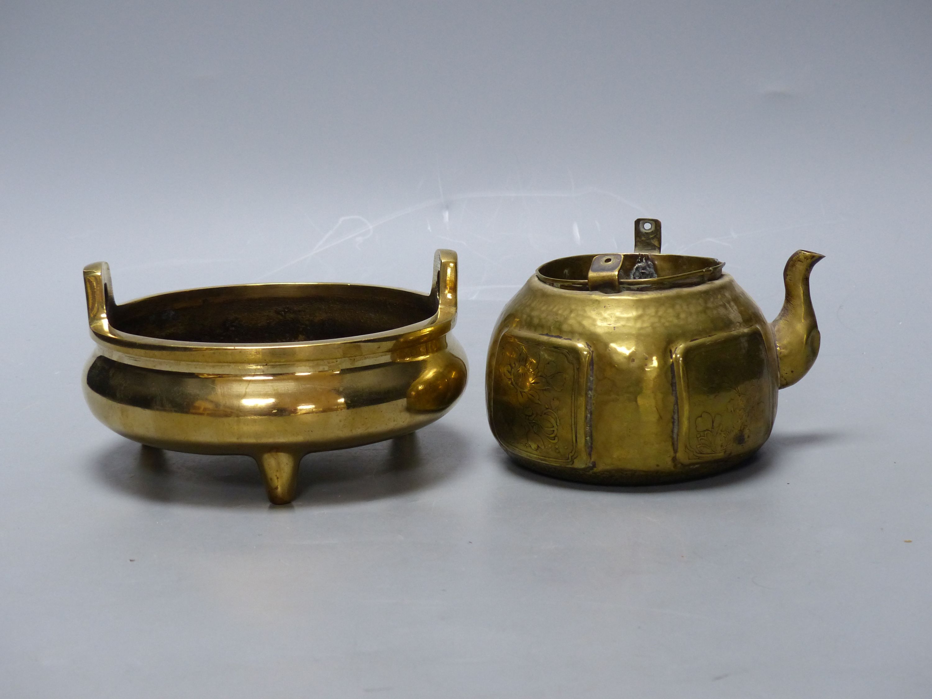 A Chinese bronze censor with Xuande mark, diameter 15cm, and a brass tea pot